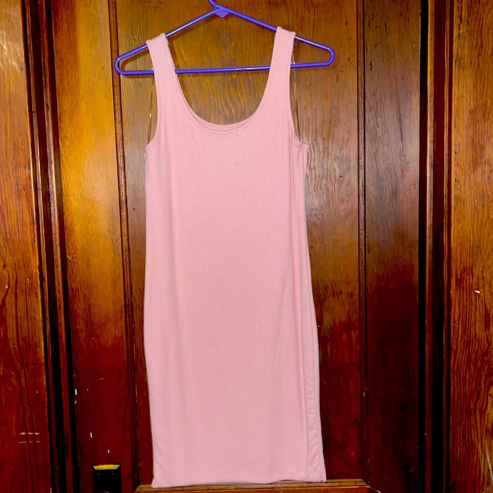2 for 1! Both dresses are size medium. Pink one worn once & red one worn twice!